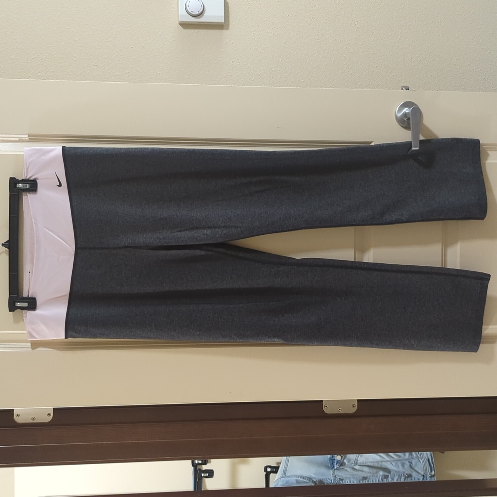 Nike Dri-Fit boot cut yoga pants. Gray with pink waist band.